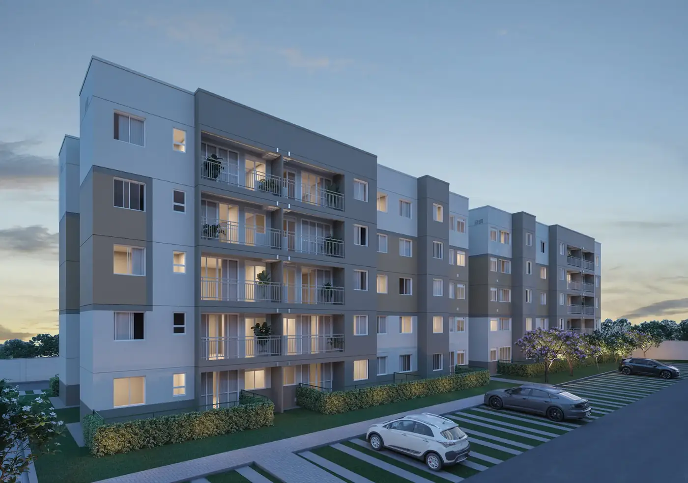 Fachada noturna do Residencial Laranjeiras